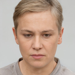 Neutral white young-adult female with short  brown hair and grey eyes