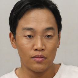 Neutral asian young-adult male with short  brown hair and brown eyes