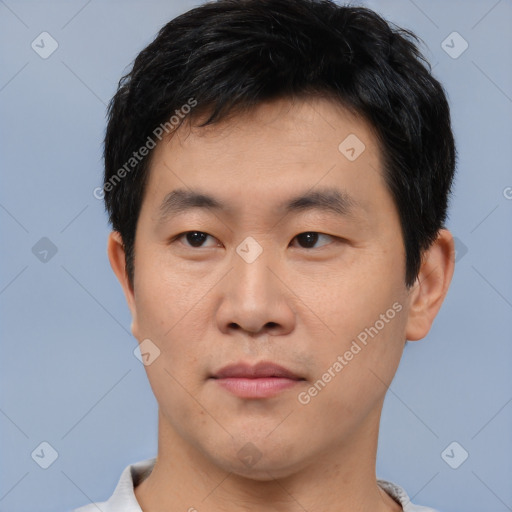 Neutral asian young-adult male with short  black hair and brown eyes