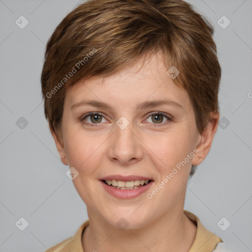 Joyful white young-adult female with short  brown hair and grey eyes