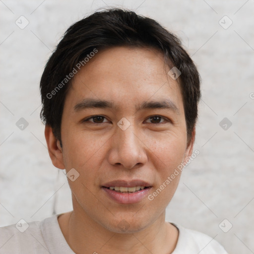 Joyful asian young-adult male with short  brown hair and brown eyes