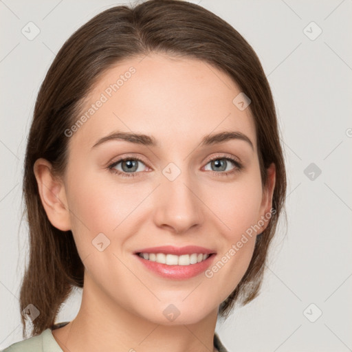 Joyful white young-adult female with medium  brown hair and green eyes