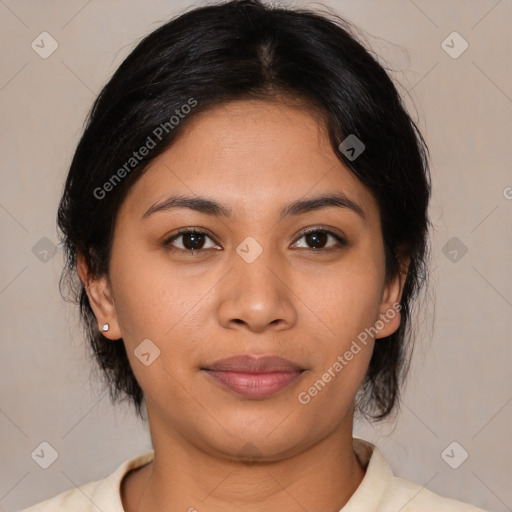 Joyful latino young-adult female with medium  brown hair and brown eyes