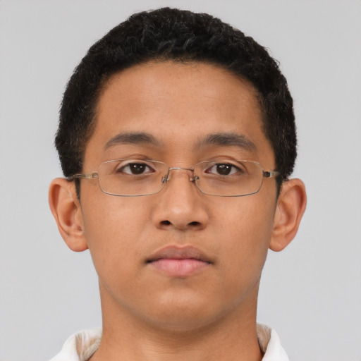 Neutral latino young-adult male with short  brown hair and brown eyes