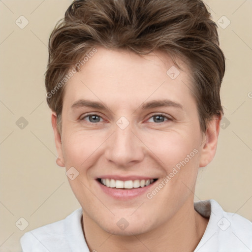 Joyful white young-adult female with short  brown hair and grey eyes