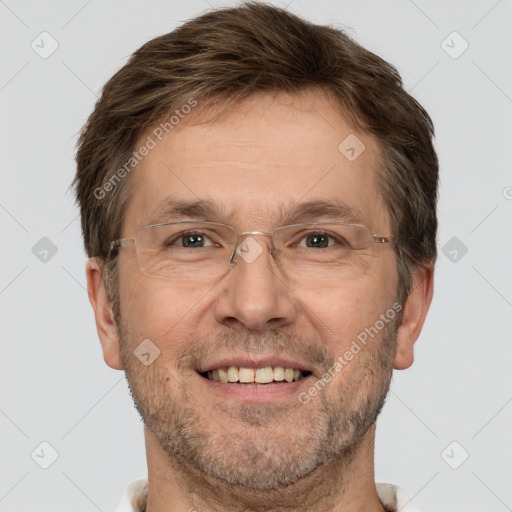 Joyful white adult male with short  brown hair and brown eyes