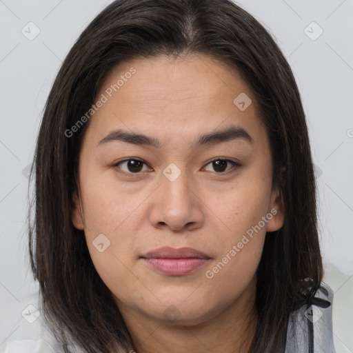 Joyful white young-adult female with long  brown hair and brown eyes