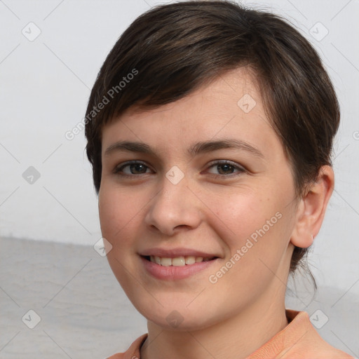 Joyful white young-adult female with short  brown hair and brown eyes