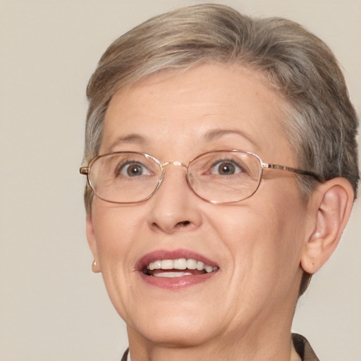 Joyful white middle-aged female with short  brown hair and brown eyes