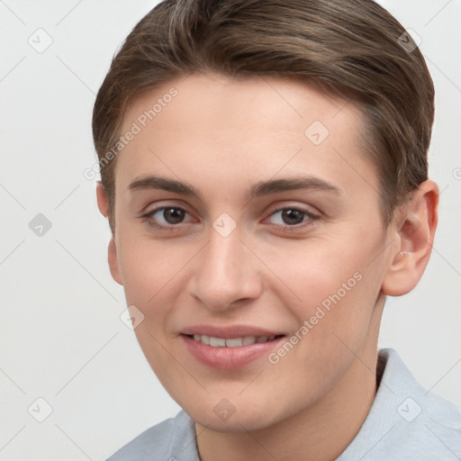 Joyful white young-adult female with short  brown hair and grey eyes