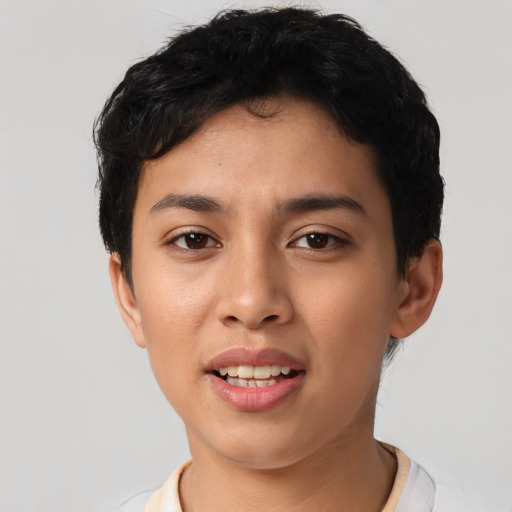 Joyful latino young-adult female with short  black hair and brown eyes