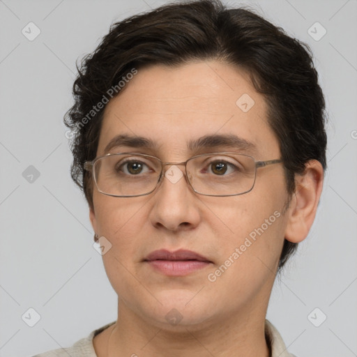 Joyful white adult female with short  brown hair and brown eyes