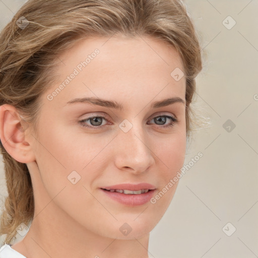 Joyful white young-adult female with medium  brown hair and green eyes