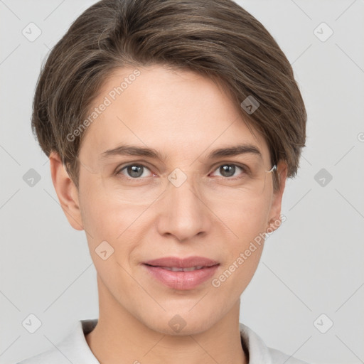 Joyful white young-adult female with short  brown hair and grey eyes