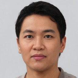 Neutral asian young-adult male with short  black hair and brown eyes