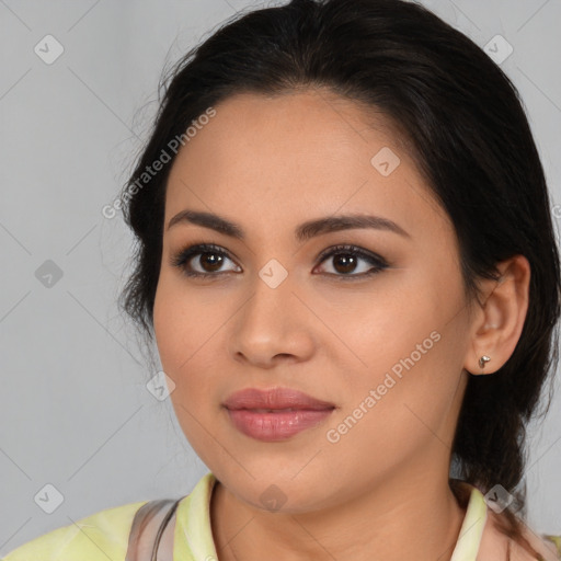 Joyful latino young-adult female with medium  brown hair and brown eyes