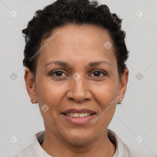 Joyful latino adult female with short  brown hair and brown eyes