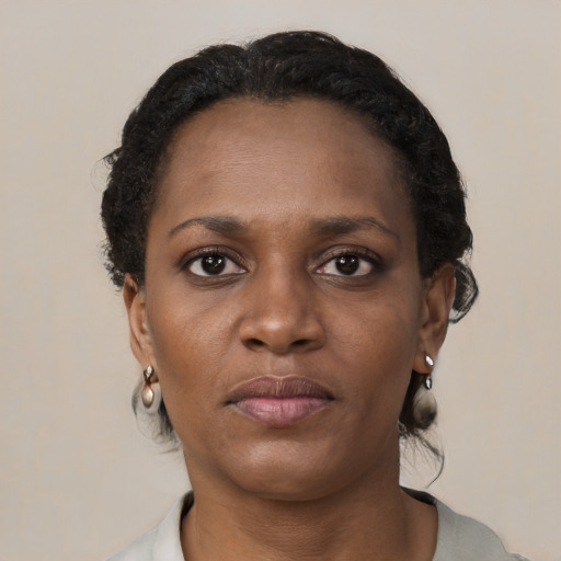 Neutral black young-adult female with short  brown hair and brown eyes