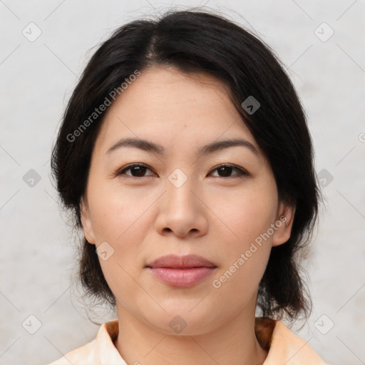 Joyful asian young-adult female with medium  brown hair and brown eyes