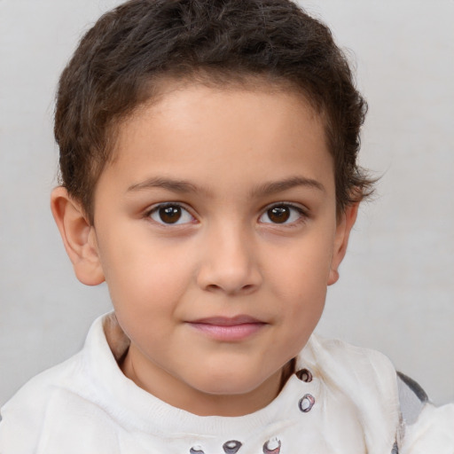 Joyful white child female with short  brown hair and brown eyes