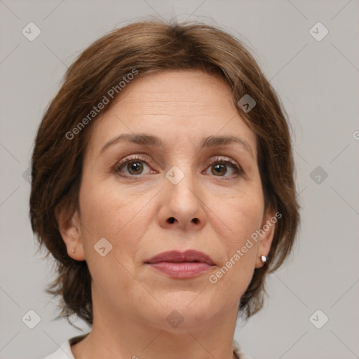 Joyful white adult female with medium  brown hair and brown eyes