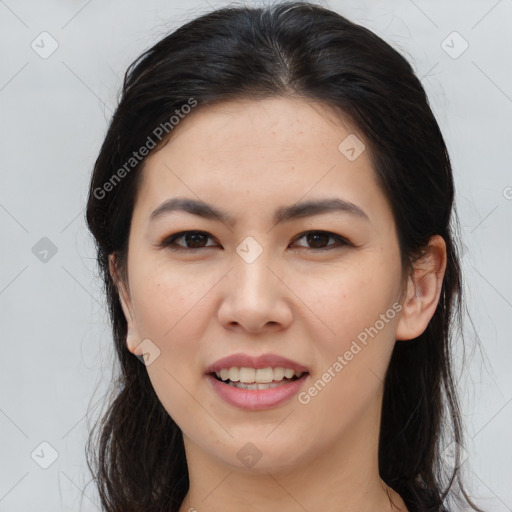 Joyful white young-adult female with long  brown hair and brown eyes