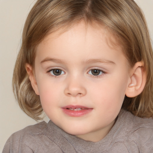 Joyful white child female with medium  brown hair and brown eyes