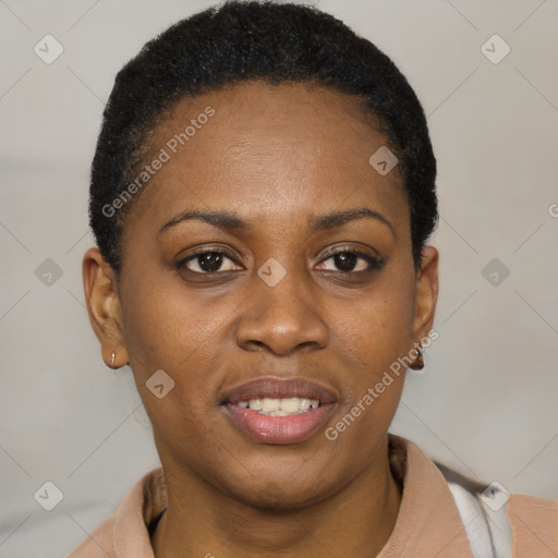 Joyful black young-adult female with short  black hair and brown eyes