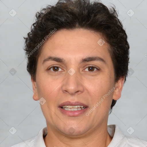 Joyful white adult female with short  brown hair and brown eyes