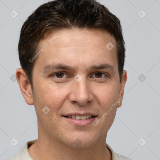 Joyful white young-adult male with short  brown hair and brown eyes