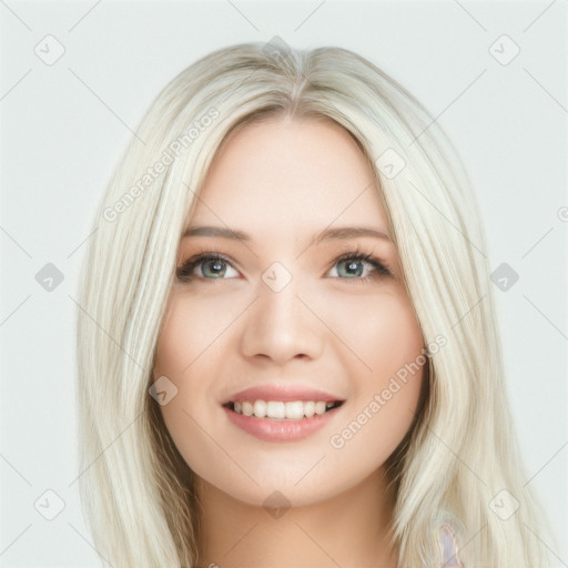 Joyful white young-adult female with long  brown hair and blue eyes