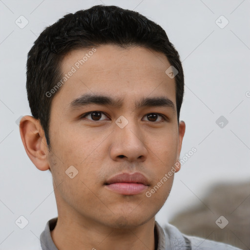 Neutral white young-adult male with short  black hair and brown eyes