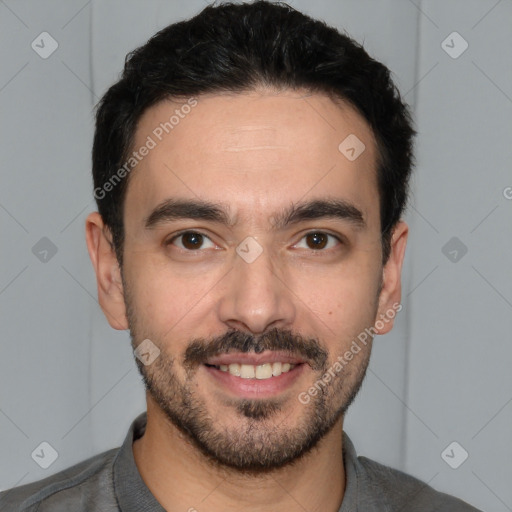 Joyful white young-adult male with short  black hair and brown eyes