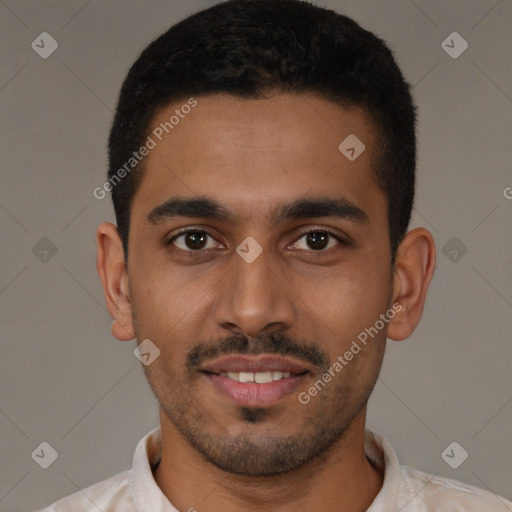 Joyful latino young-adult male with short  black hair and brown eyes