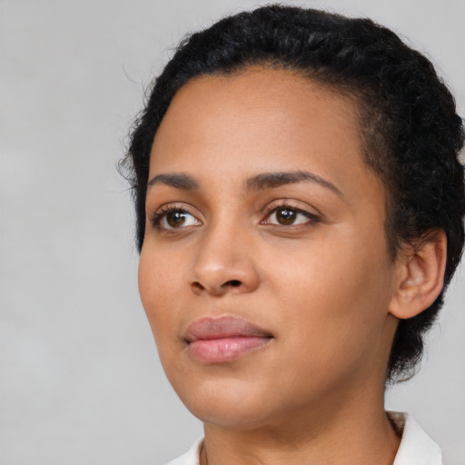 Neutral latino young-adult female with medium  black hair and brown eyes