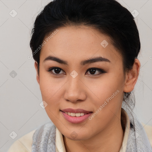 Joyful latino young-adult female with short  brown hair and brown eyes