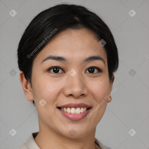 Joyful asian young-adult female with medium  brown hair and brown eyes