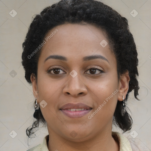 Joyful black young-adult female with medium  brown hair and brown eyes