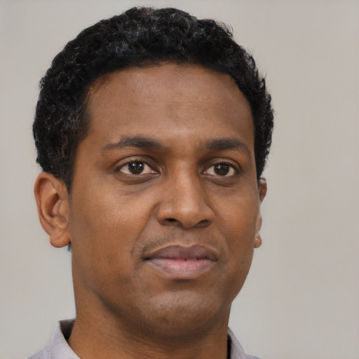 Neutral black young-adult male with short  brown hair and brown eyes