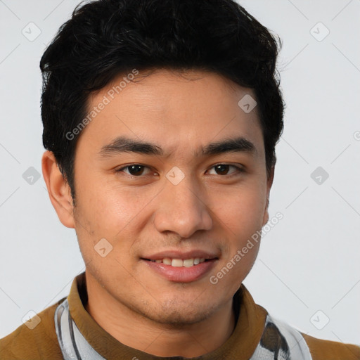 Joyful latino young-adult male with short  brown hair and brown eyes