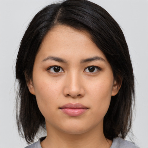 Neutral asian young-adult female with medium  black hair and brown eyes