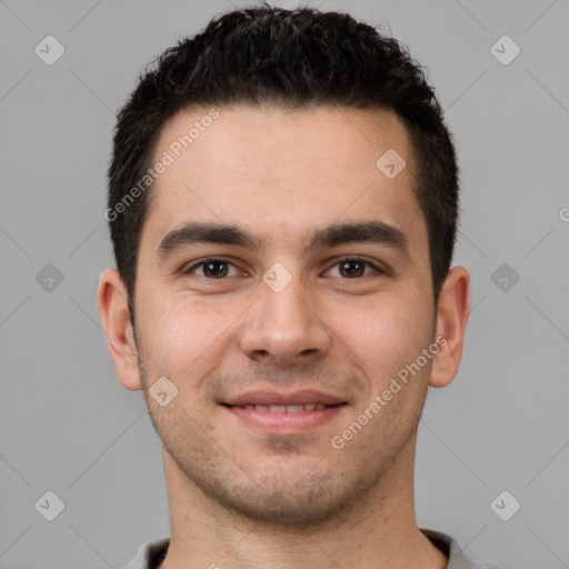 Joyful white young-adult male with short  brown hair and brown eyes