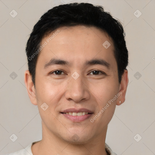 Joyful white young-adult male with short  black hair and brown eyes