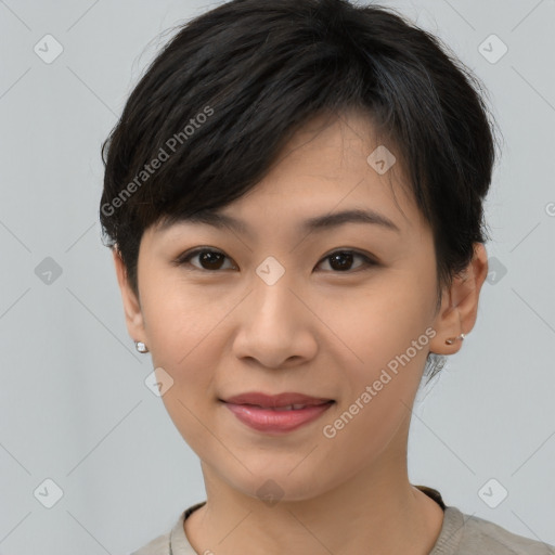 Joyful asian young-adult female with short  brown hair and brown eyes