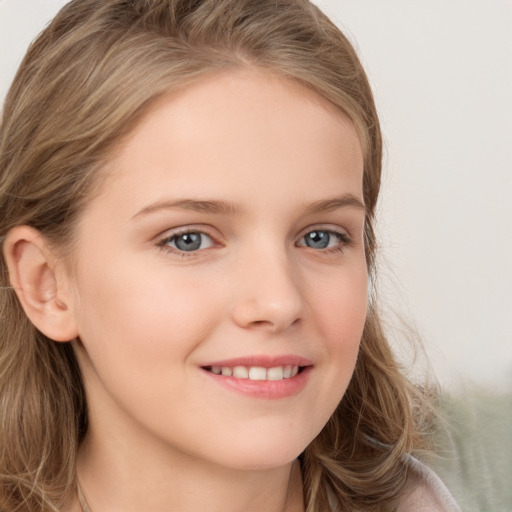 Joyful white child female with long  brown hair and grey eyes