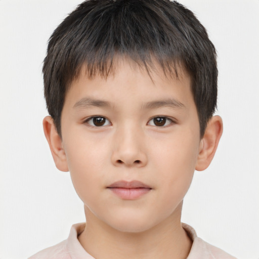 Neutral asian child male with short  brown hair and brown eyes