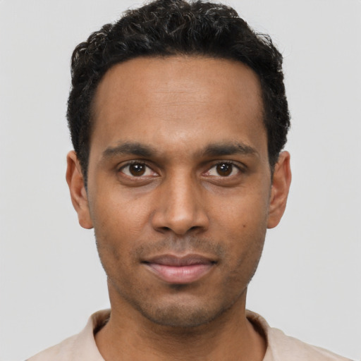 Neutral black young-adult male with short  black hair and brown eyes