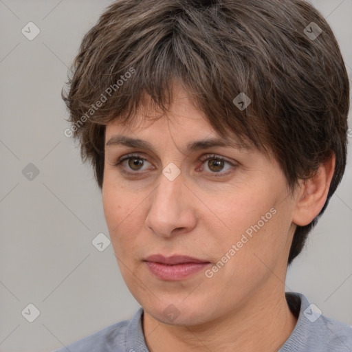 Joyful white adult female with short  brown hair and brown eyes