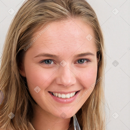 Joyful white young-adult female with long  brown hair and blue eyes