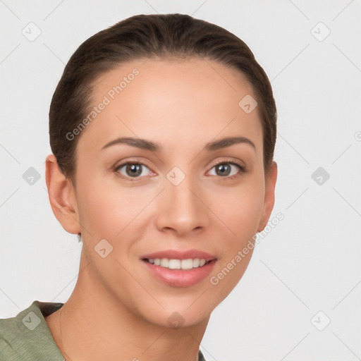 Joyful white young-adult female with short  brown hair and brown eyes